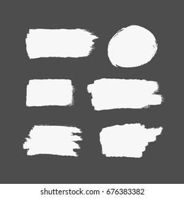 Texture of white brush strokes. Rectangular and round strokes. Set of isolated brushstrokes. Grunge, sketch, graffiti, paint splash. Vector illustration.