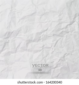 Texture of white crumpled paper background 