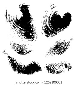 Textured black ink strokes and stamps set isolated on a white background