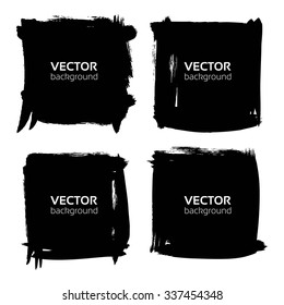 Textured black long bannners from paint strokes isolated on a white background