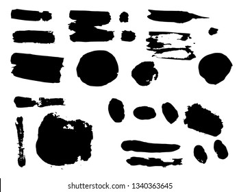 Textured black strokes of paint isolated on white background