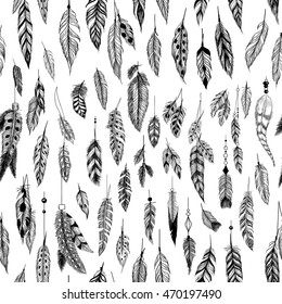 Textured feathers in aztec (boho) style. Seamless pattern.