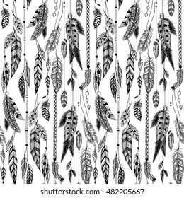 Textured feathers in aztec (boho) style. Seamless pattern.