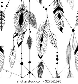 Texturierte Federn und Kristalle im aztec (boho) Stil. Nahtloses Muster.