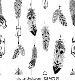 Textured feathers and crystals in aztec (boho) style. Seamless pattern.