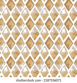 Textured geometric background with rhombuses in yellow. Seamless  pattern in autumn