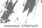 Textured grey paint splatters and brush strokes on a white background abstract grunge pattern black chalk