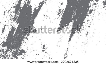 Textured grey paint splatters and brush strokes on a white background abstract grunge pattern black chalk