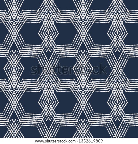 Textured line geometric shape seamless repeat vector pattern with hexagons and diamonds in navy and cream.