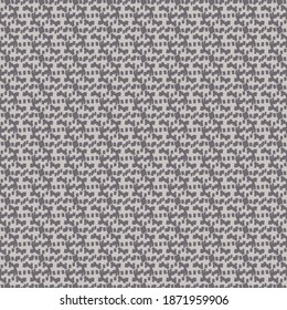 Textured pattern made of tiny patches, in which are distinguished especially some elements arranged in a zigzag. Gray wallpaper texture.