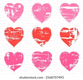 Textured pink and red hearts, vector grunge shapes with various marks, lines, scratches on light pink illegible hand written text for love themed graphic design 