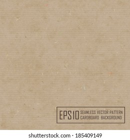 Textured recycled cardboard with natural multicolored fiber parts.