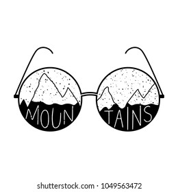 Textured round glasses with hand drawn mountains in shapes of lenses. Lettering in sunglasses. Travel badge for t-shirt print, inspirational poster and motivational design.