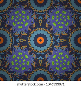 Textured seamless pattern. Orient popular style. Sloping seamless colorful ornament for design and backgrounds. Abstract blurred paisley orange, blue and violet ornament. Vector illustration.