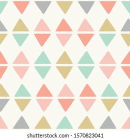 Textured triangles in a geometric diamond seamless vector pattern. A sweet repeat design background ideal for children and baby projects.