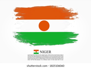 Bandera texturizada y vectorial de Níger dibujada con pinceladas. Bandera de textura y vector de Níger dibujada con pinceladas.