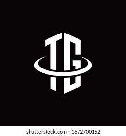 Logotipo de monogramo TG en forma de hexágono y rodeado por un anillo
