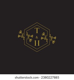 TH elegant wedding initial logo in high quality professional design that will print well across any print media