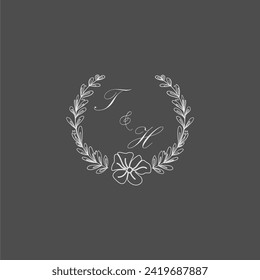 TH initial monogram wedding with creative leaf