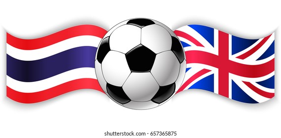 Thai and British wavy flags with football ball. Thailand combined with United Kingdom isolated on white. Football match or international sport competition concept.