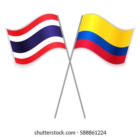 Thai and Colombian crossed flags. Thailand combined with Colombia isolated on white. Language learning, international business or travel concept.