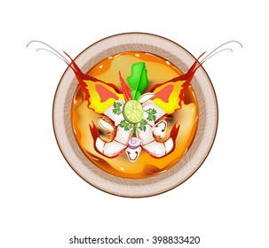 Thai Cuisine, Tom Yum Goong or Thai Spicy and Sour Soup with Shrimps, Mushroom, Coconut Milk and Herbs. One of The Most Popular Thai Recipes in The World.