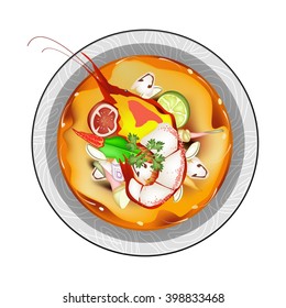 Thai Cuisine, Tom Yum Goong or Thai Spicy and Sour Soup with Shrimps, Mushroom, Coconut Milk and Herbs. One of The Most Famous Food in Thailand.