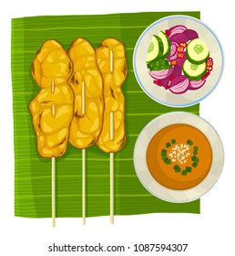 Thai Food - Satay on banana leaf, served with peanut sauce and ajad sauce, top view