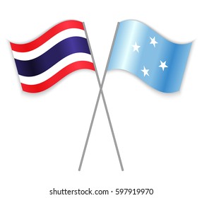 Thai and Micronesian crossed flags. Thailand combined with Micronesia isolated on white. Language learning, international business or travel concept.