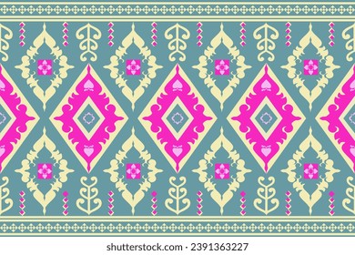 Thai  paisley embroidery on green background.geometric ethnic oriental seamless pattern traditional.Aztec style abstract vector.design for texture,fabric,clothing,wrapping,sarong,decoration,print.