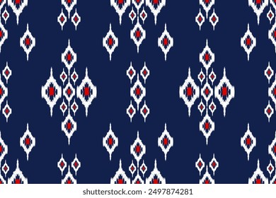 Thai seamless pattern.Ikat floral design seamless pattern on navy blue background vector illustration.Ikat ethnic oriental embroidery.Ikat Aztec style.design for texture,fabric,clothing,decoration.