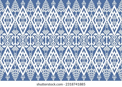 Thai traditional fabric pattern for design in fashion. Indigo-dyed fabric pattern in Thailand. Mudmee silk pattern design for weaving, fabric printing for textile products. Thai fabric background.