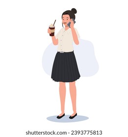 Thai university Student Multitasking with Iced Coffee and Smartphone on Campus