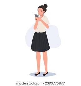 Thai university Student in uniform is Messaging on Smartphone, Texting on Phone