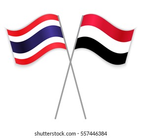 Thai and Yemeni crossed flags. Thailand combined with Yemen isolated on white. Language learning, international business or travel concept.