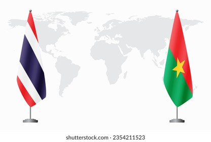 Thailand and Burkina Faso flags for official meeting against background of world map.