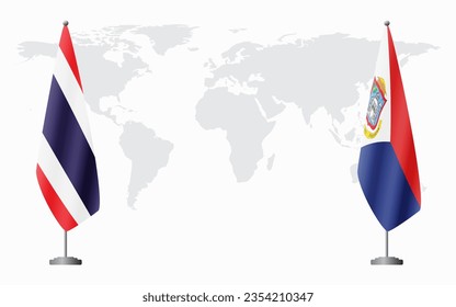 Thailand and Sint Maarten flags for official meeting against background of world map.