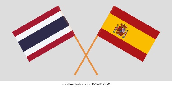 Thailand and Spain. Crossed Thai and Spanish flags. Official colors. Correct proportion. Vector illustration
