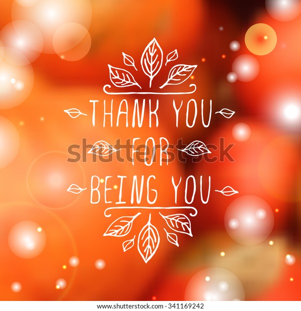 Thank you for being you. Hand sketched graphic\
vector element with leaves and text on blurred background.\
Thanksgiving design.