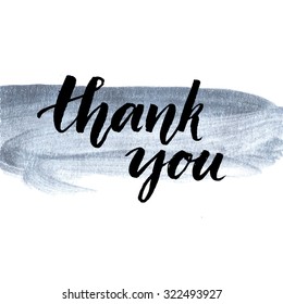 Thank you. Calligraphy phrase handwritten on silver paint stroke. Brush lettering for client service, message after purchase. Vector design.