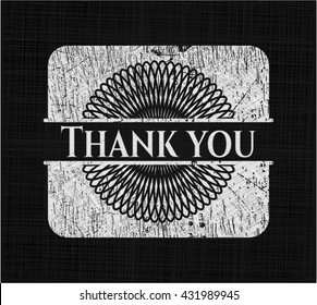 Thank you chalk emblem written on a blackboard