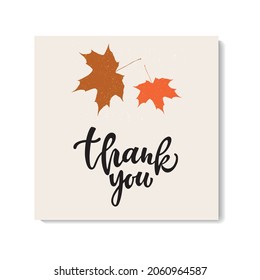 Thank you compliment card with handwritten text and autumn leaves. Hand lettering typography isolated on white background. Vector illustration.  Modern brush ink calligraphy