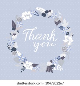 Thank You greeting card with floral wreath and lettering, floral frame on light blue background