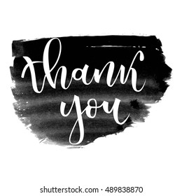 Thank you hand lettering greeting on black grunge banner background