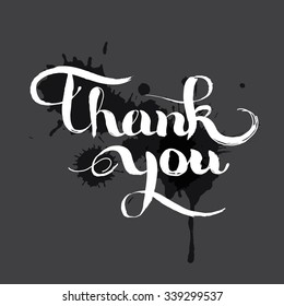 Thank you ink hand dark lettering. Abstract watercolor black background.