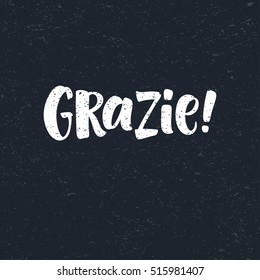 Thank you lettering in italian: Grazie! Hand drawn vector phrase. Handwritten modern brush calligraphy for invitation and greeting card, t-shirt, prints and postersChalk texture background