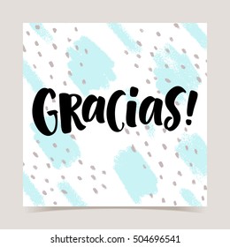 Thank you lettering in spanish: Gracias! Hand drawn phrase on abstract texture background. Handwritten modern brush calligraphy for invitation and greeting card, t-shirt, prints and posters