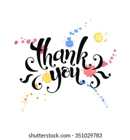 Thank you lettering with watercolor splashes on background. Modern black ink typography. Thank you colorful postcard calligraphy design. 