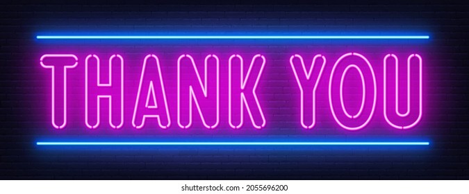 Thank you neon sign on brick wall background.