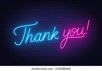 Thank you neon sign on brick wall background.